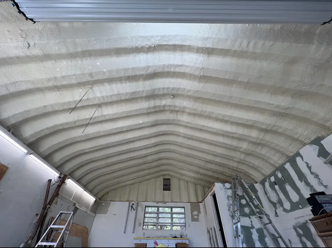 Spray polyurethane foam applied to the underside of a metal roof deck in Haines City